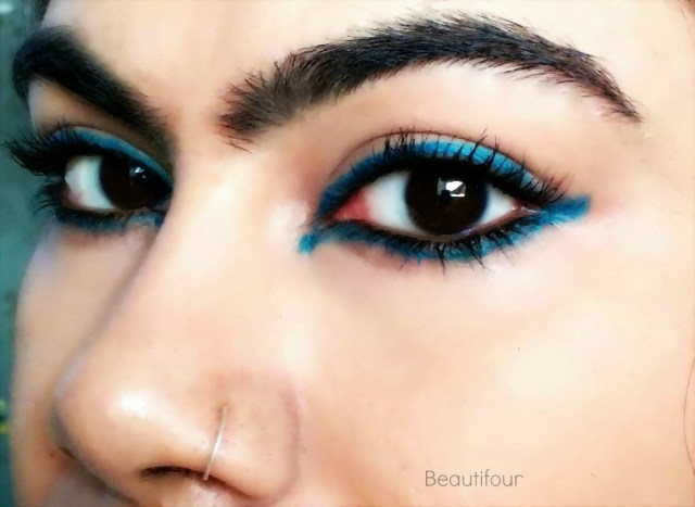 Reverse cat eye using Maybelline Colossal Kohl Turquoise
