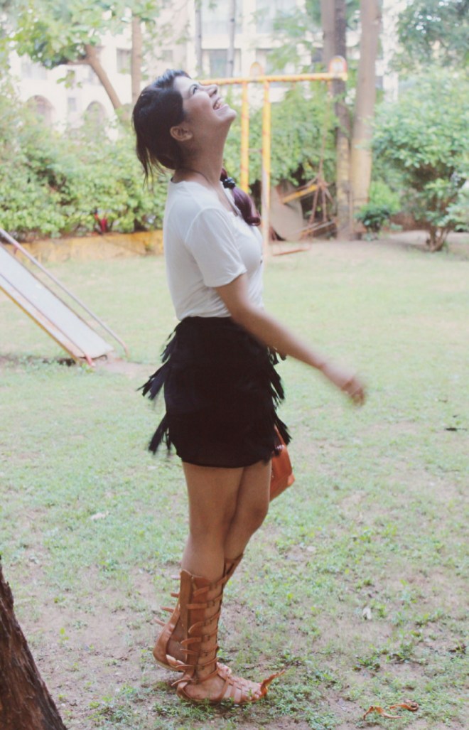 Fringe skirt and gladiator shoes